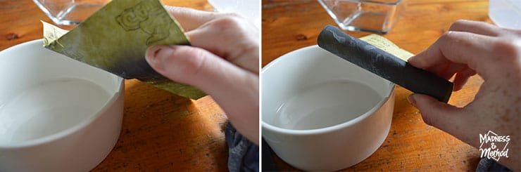 sanding chipped glassware with paper