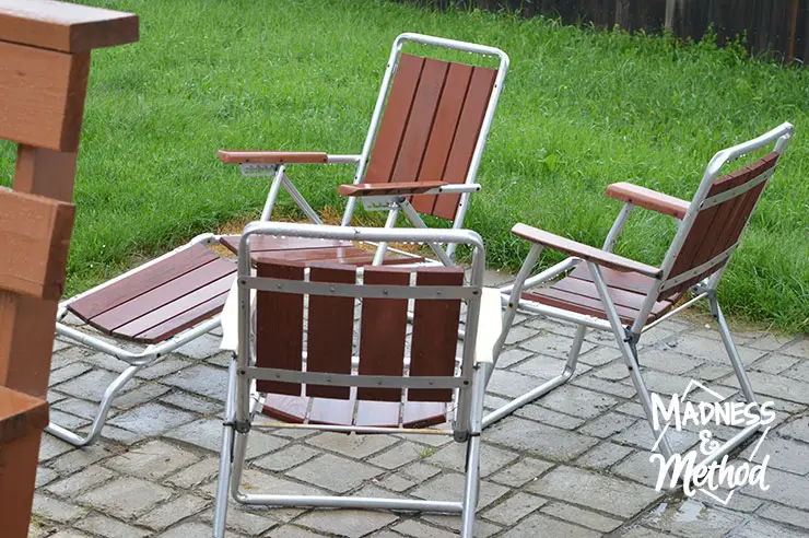 Antique patio chairs on concrete patio