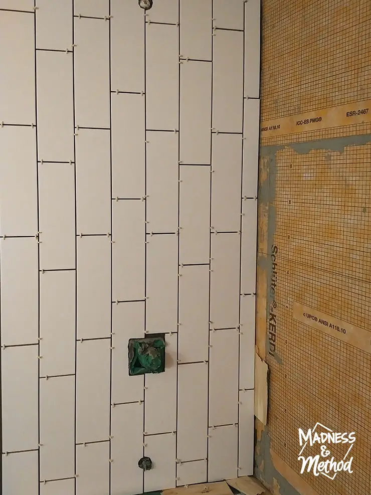 starting tile pattern in bathtub