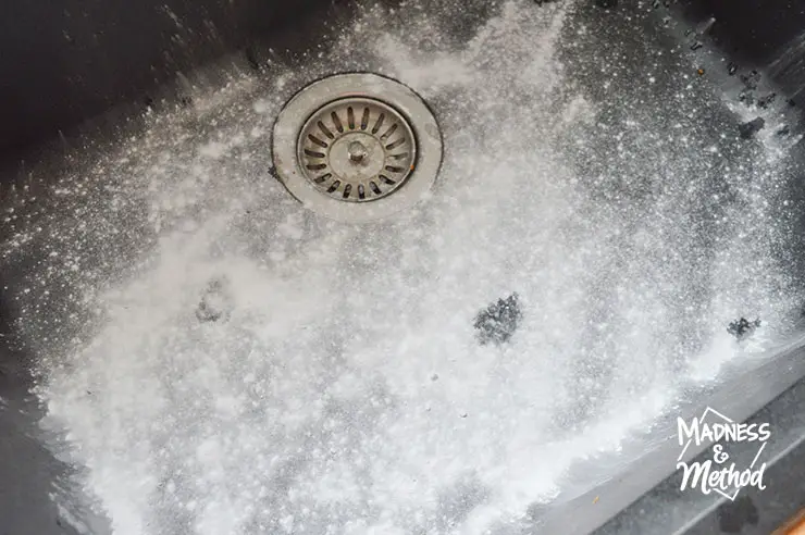 black kitchen sink with baking soda powder