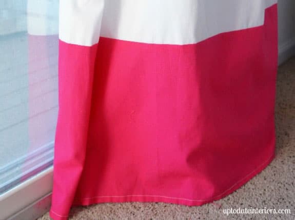 white curtain with bright pink edge