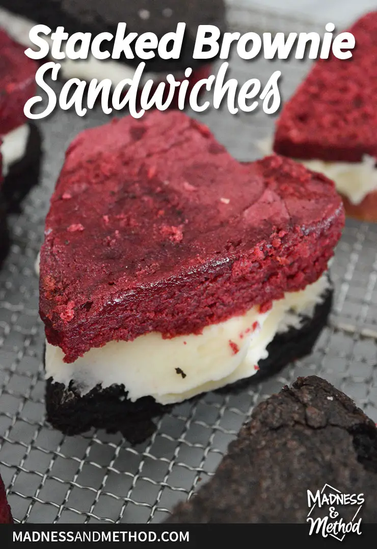 red velvet heart shaped brownie with frosting and stacked brownie sandwiches text overlay