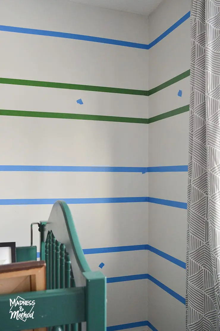 painters tape making stripes on white walls