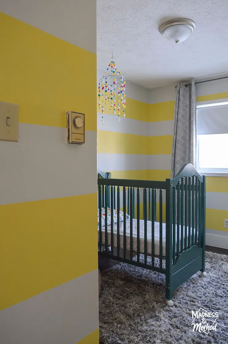 yellow white stripes green crib