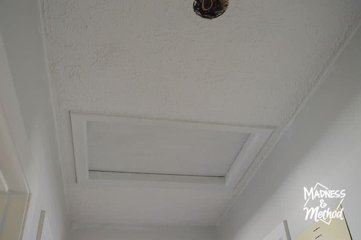 textured ceiling with attic access