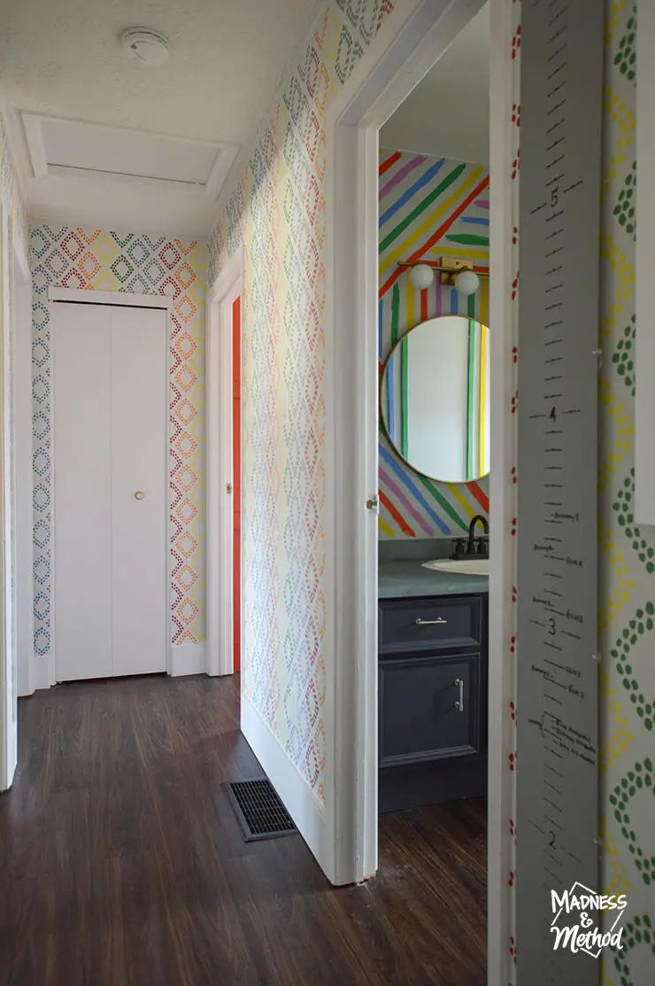 colourful hallway to rainbow bathroom
