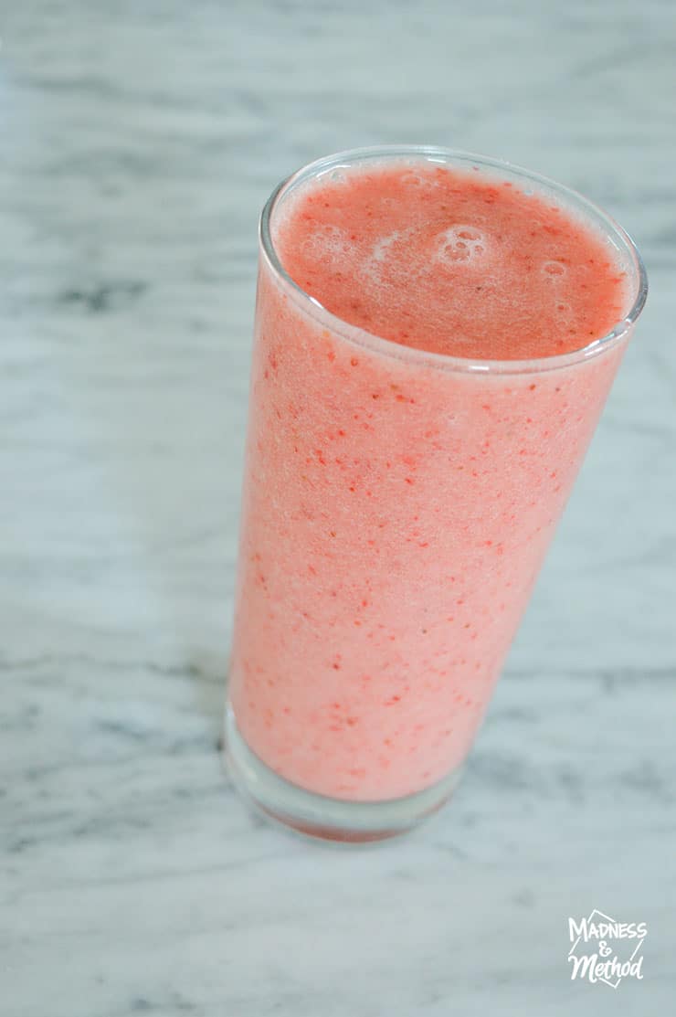 pink smoothie in clear glass