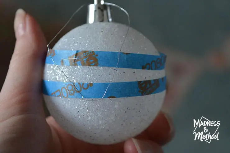 attempting to use tape on glitter ornaments