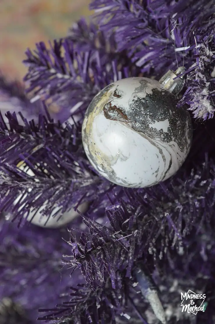 marble ornament on purple tree