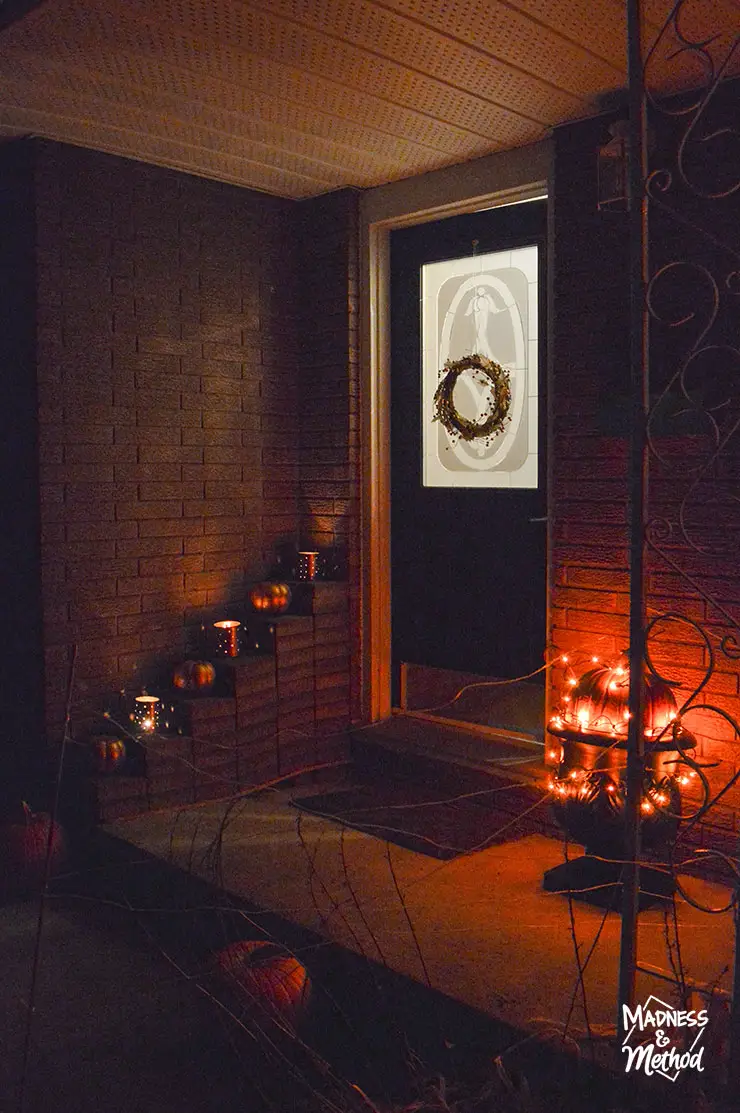 halloween decor with tin can lanterns