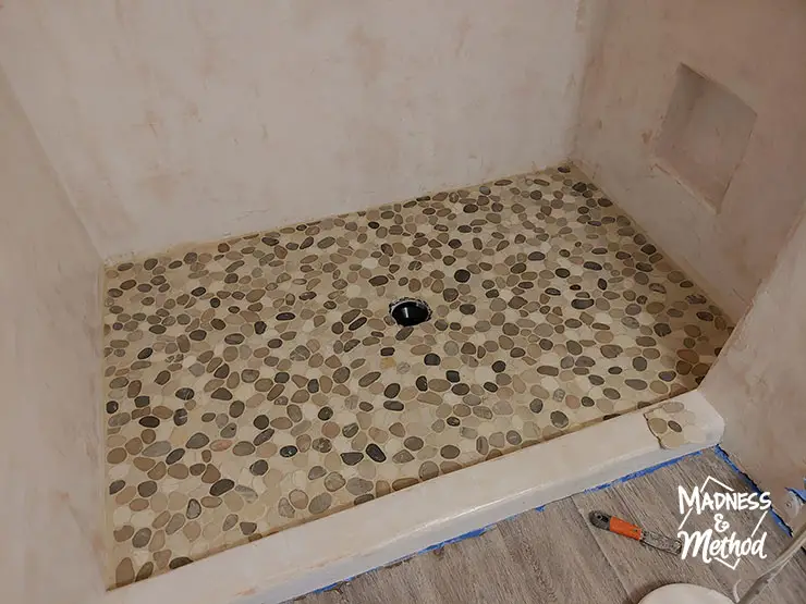 pebble tiles shower floor