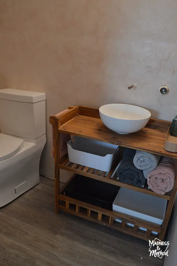 wood shelf vanity with bins