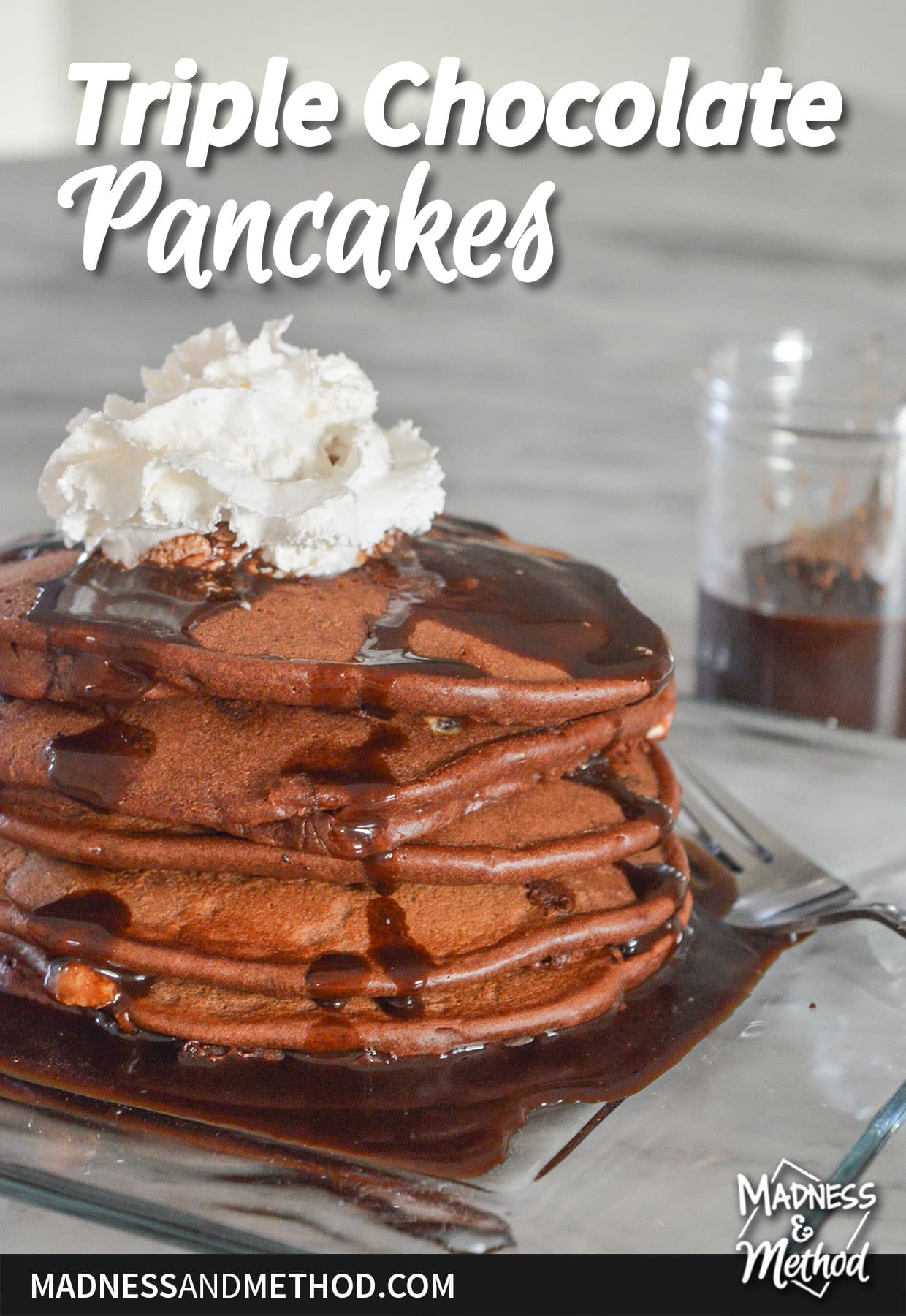 whipped cream on triple chocolate pancakes