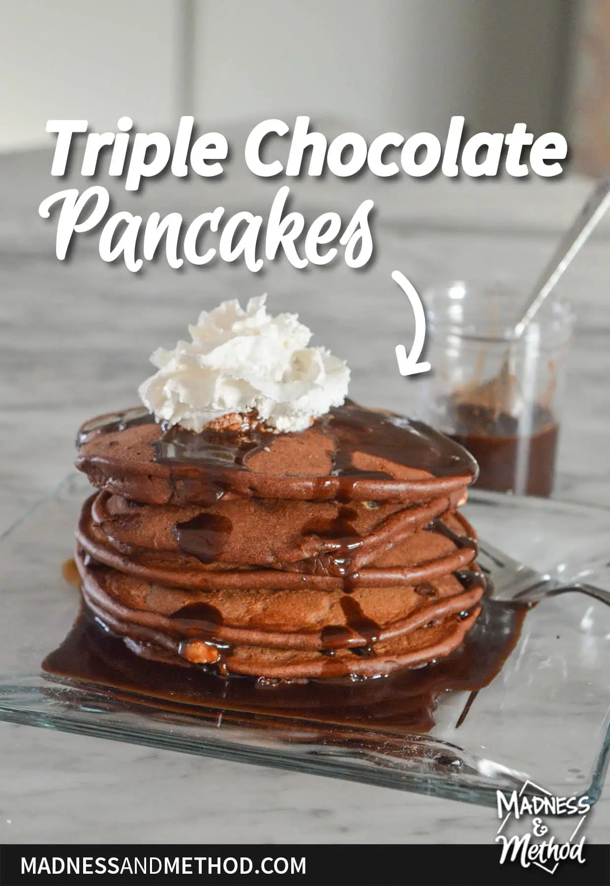 drizzled triple chocolate pancakes with whipped cream