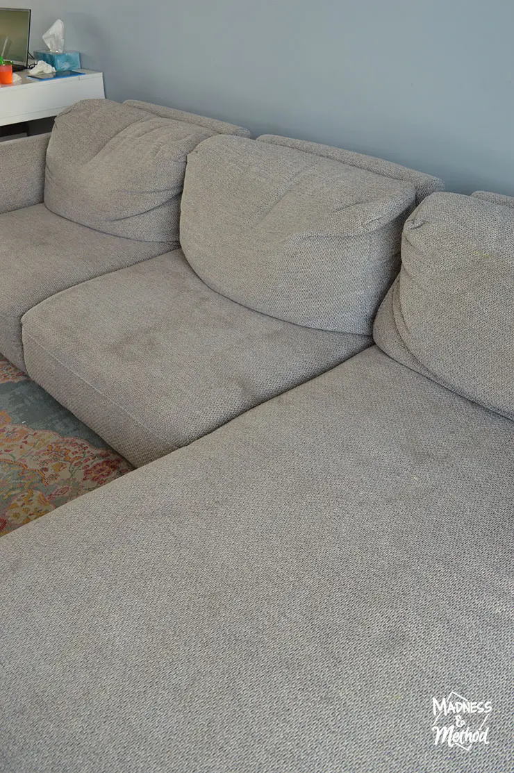 gray sofa sectional stained