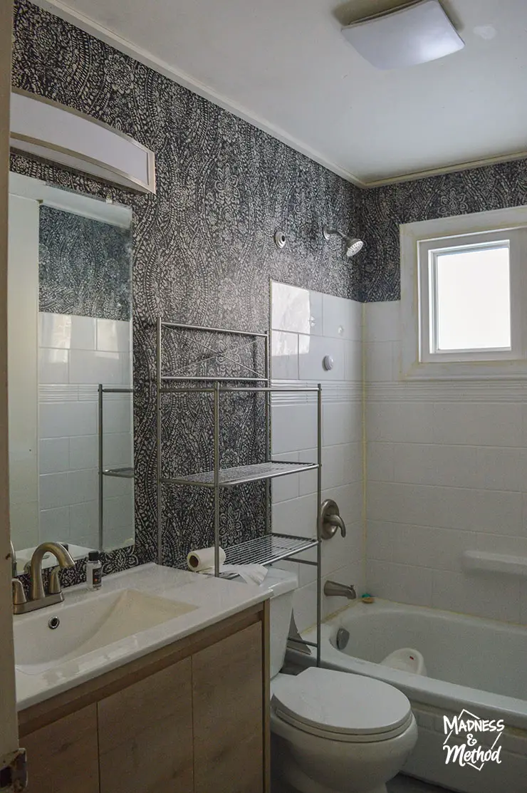 bathroom with black walls and white surround