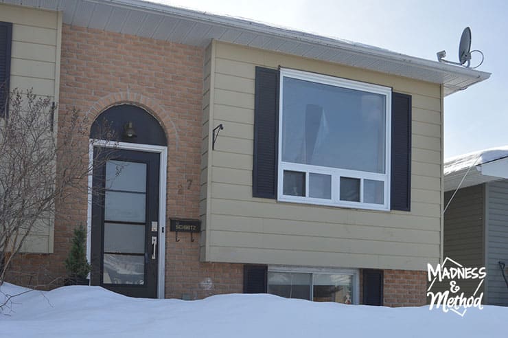 raised ranch facade in winter