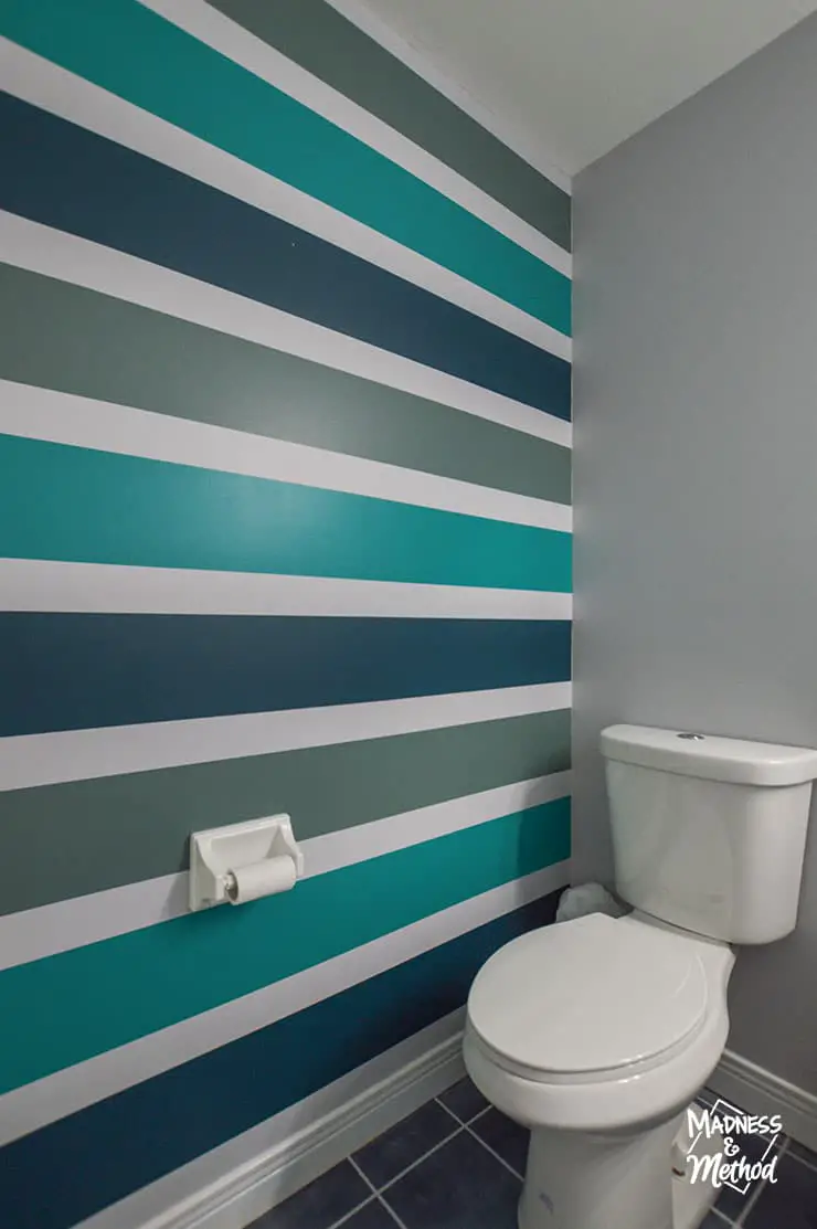 teal striped accent wall