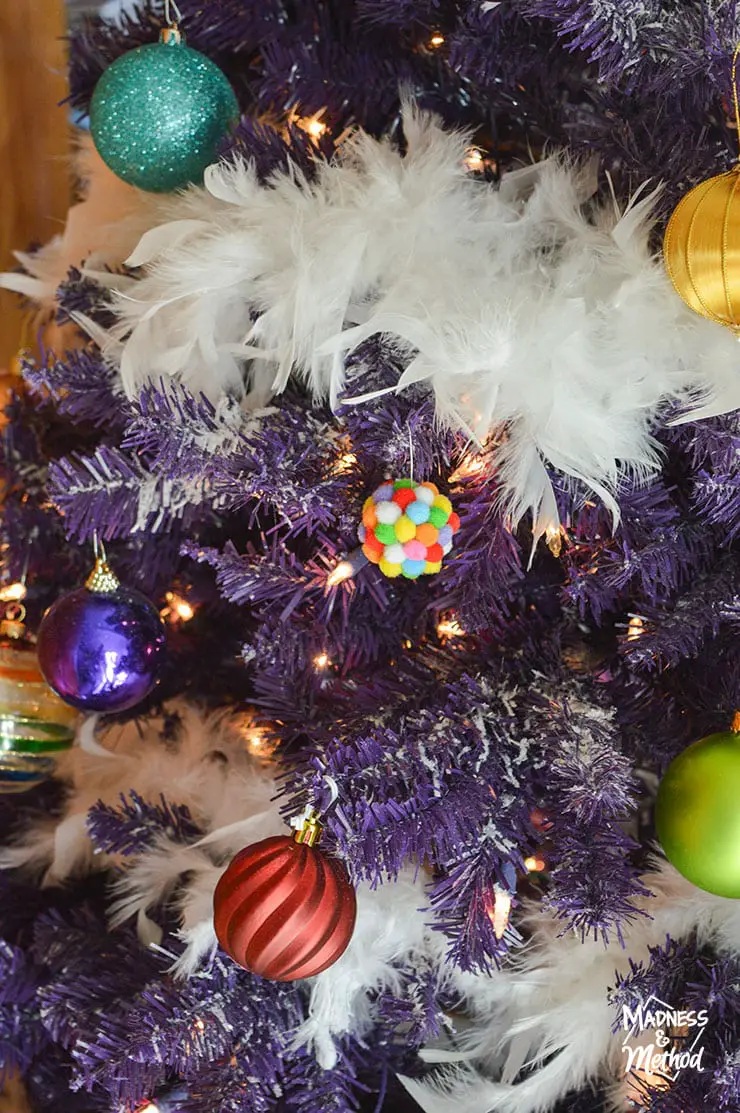 pompom ornament on purple tree