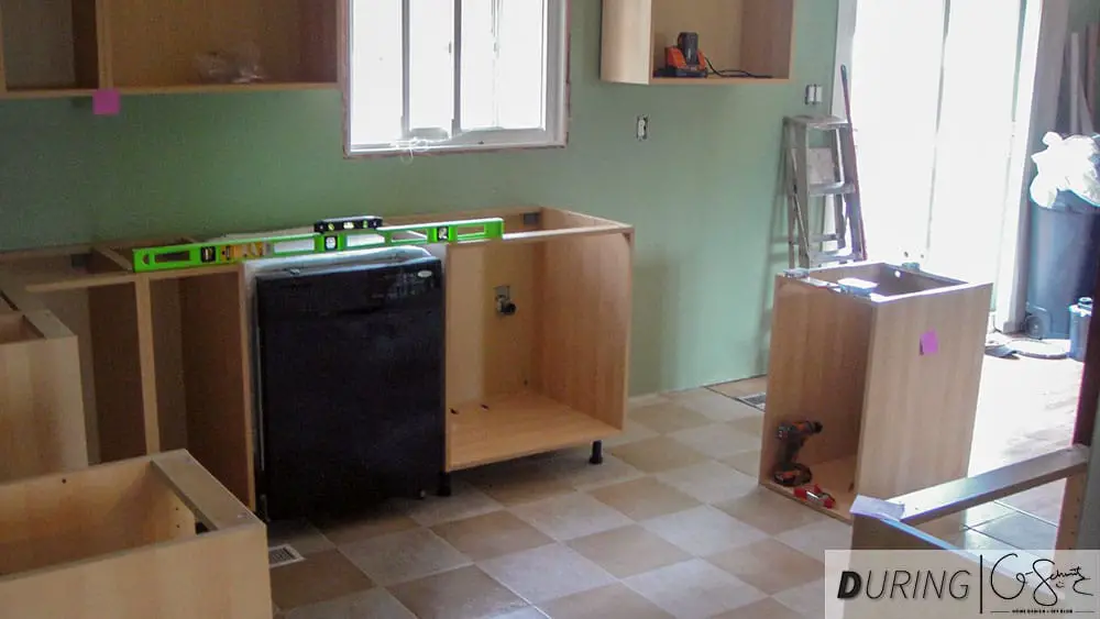 Installing kitchen base cabinets