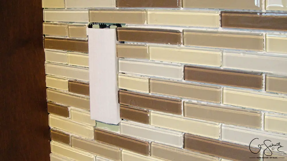 How to lay & prep tiles for a finished kitchen backsplash. These easy to follow DIY instructions will help you better plan the layout for your backsplash!