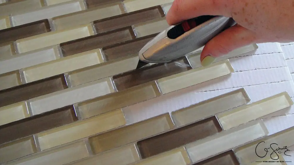 How to lay & prep tiles for a finished kitchen backsplash. These easy to follow DIY instructions will help you better plan the layout for your backsplash!