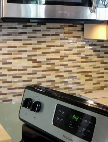 How to lay & prep tiles for a finished kitchen backsplash. These easy to follow DIY instructions will help you better plan the layout for your backsplash!