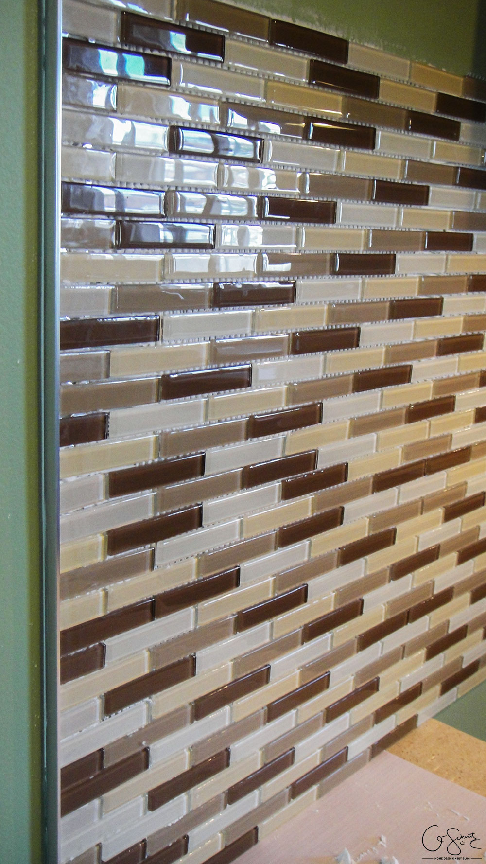 How to lay & prep tiles for a finished kitchen backsplash. These easy to follow DIY instructions will help you better plan the layout for your backsplash!