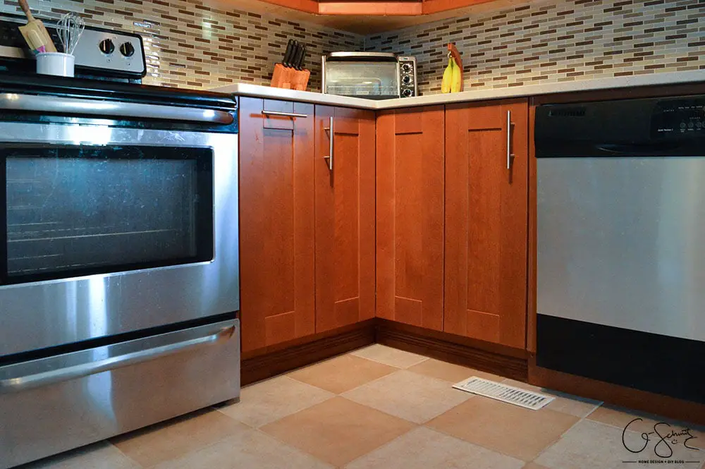 The before and after photo reveal of our DIY kitchen renovation. Check out all the great features we added to make this space unique. I can’t believe what it used to look like!