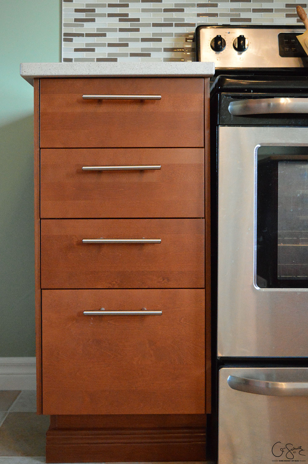 The before and after photo reveal of our DIY kitchen renovation. Check out all the great features we added to make this space unique. I can’t believe what it used to look like!