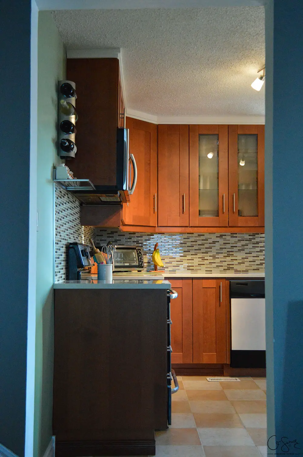 The before and after photo reveal of our DIY kitchen renovation. Check out all the great features we added to make this space unique. I can’t believe what it used to look like!