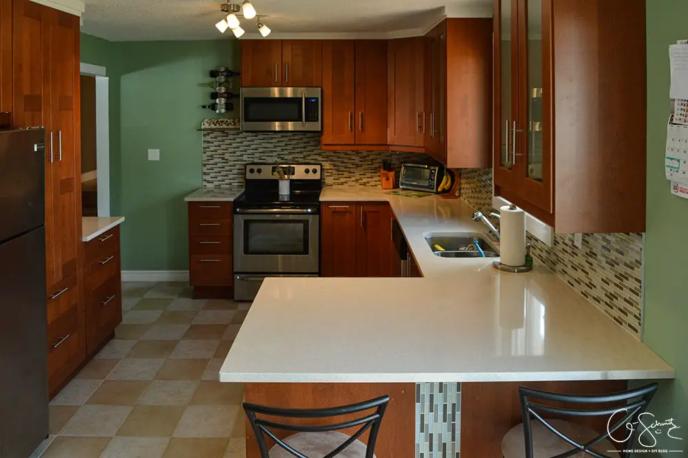 Finally - the before and after photo reveal of our DIY kitchen renovation. Check out all the great features we added to make this space unique. I can’t believe what it used to look like!