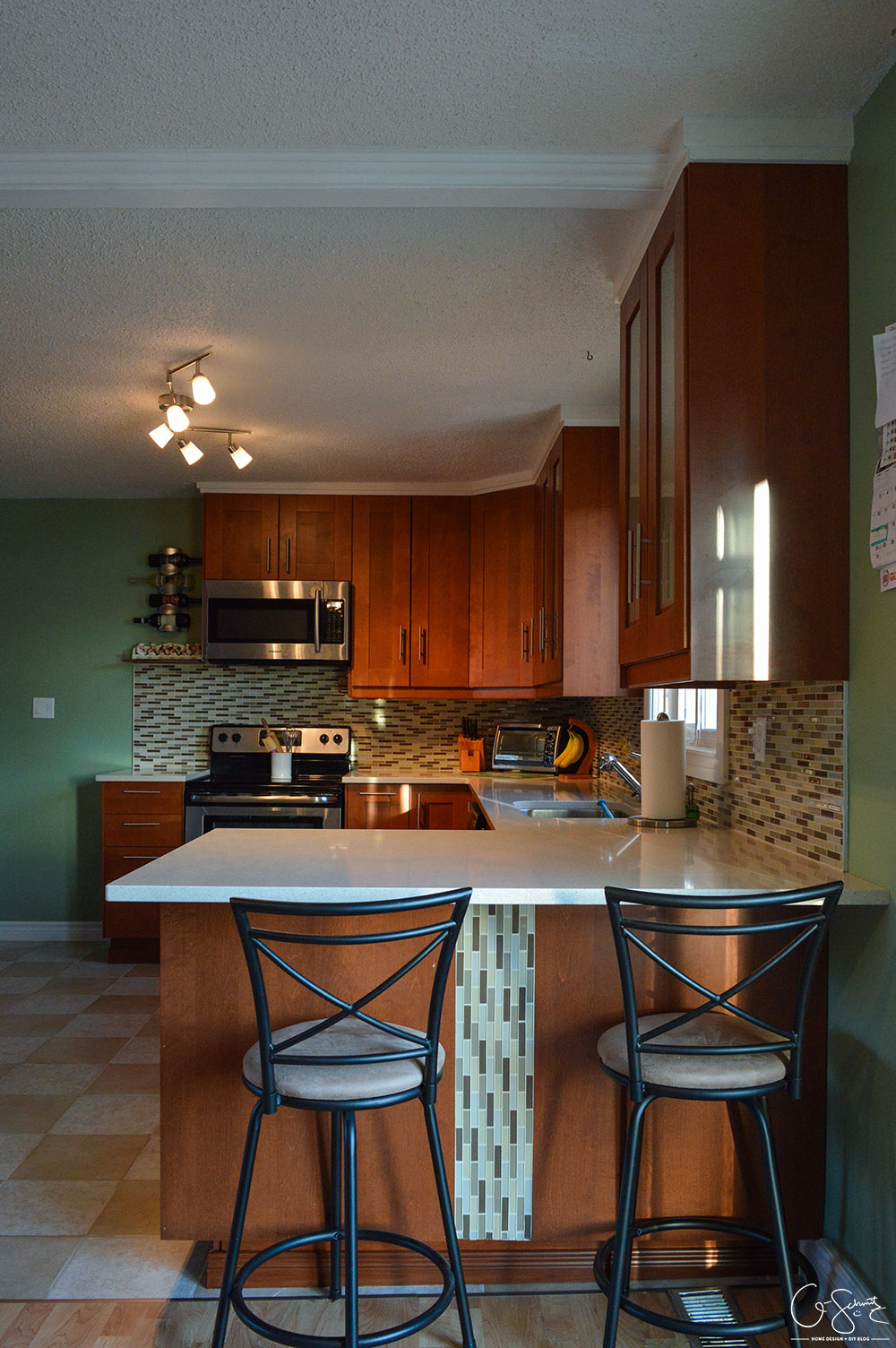 The before and after photo reveal of our DIY kitchen renovation. Check out all the great features we added to make this space unique. I can’t believe what it used to look like!