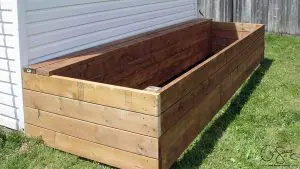 Looking for a DIY build project to kick-start your summer gardening? Here are some easy to follow instructions for building a raised garden bed along a shed (or fence, or whatever!) that you can easily adapt to your space.