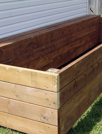 Looking for a DIY build project to kick-start your summer gardening? Here are some easy to follow instructions for building a raised garden bed along a shed (or fence, or whatever!) that you can easily adapt to your space.