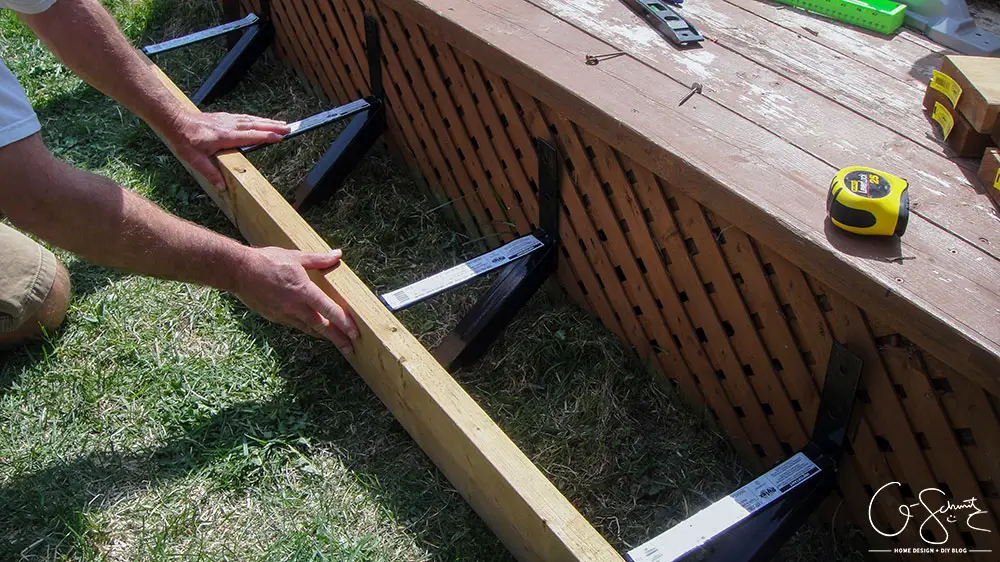 This was probably the quickest and easiest summer DIY project so far! Building a single step with brackets adds safety to your deck experience. For those thinking of adding a deck step, I hope my tips help you avoid some mistakes!