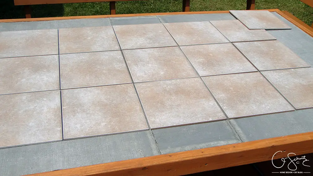 Did your glass patio tabletop break and you’re looking to make a new top? Here’s a super-duper custom patio table that I made using lots of leftover materials. It’s an easy DIY project that can be almost completely customized to anything you want!