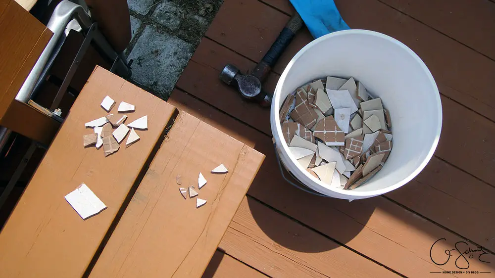 Did your glass patio tabletop break and you’re looking to make a new top? Here’s a super-duper custom patio table that I made using lots of leftover materials. It’s an easy DIY project that can be almost completely customized to anything you want!