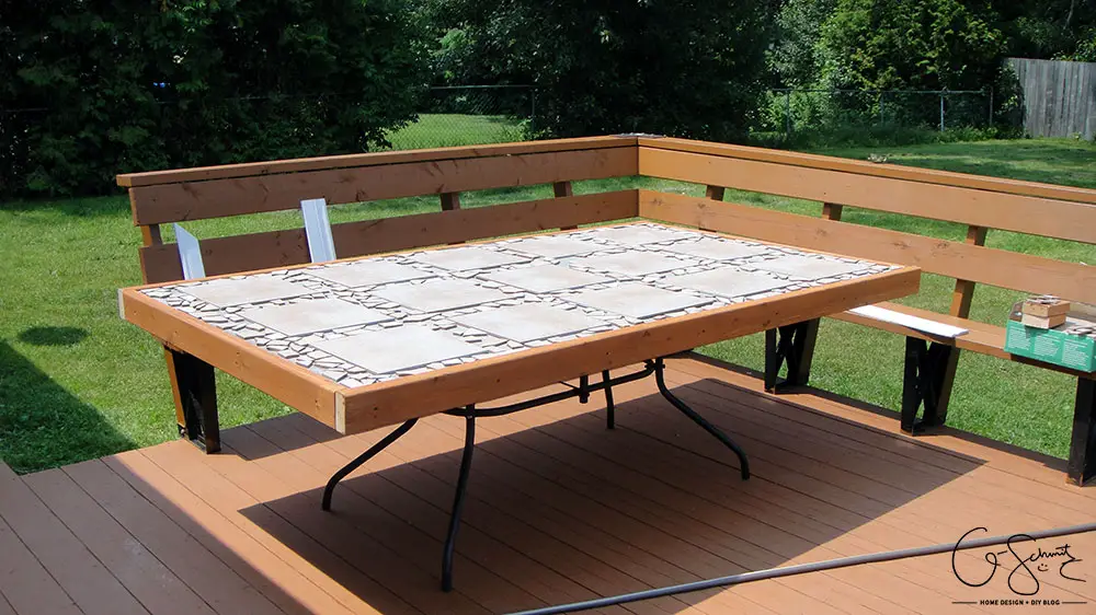 Did your glass patio tabletop break and you’re looking to make a new top? Here’s a super-duper custom patio table that I made using lots of leftover materials. It’s an easy DIY project that can be almost completely customized to anything you want!