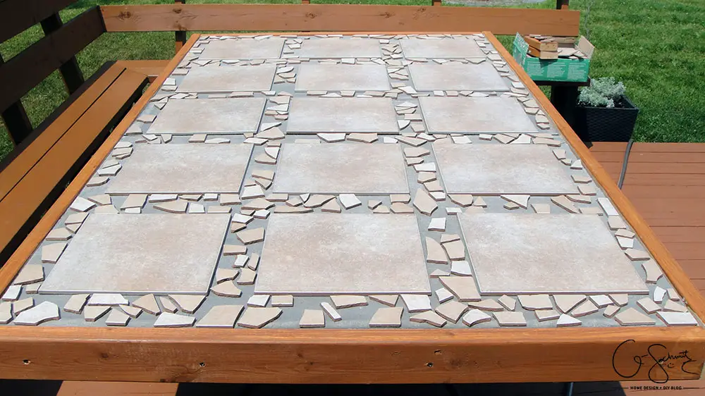 Did your glass patio tabletop break and you’re looking to make a new top? Here’s a super-duper custom patio table that I made using lots of leftover materials. It’s an easy DIY project that can be almost completely customized to anything you want!