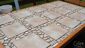 Did your glass patio tabletop break and you’re looking to make a new top? Here’s a super-duper custom patio table that I made using lots of leftover materials. It’s an easy DIY project that can be almost completely customized to anything you want!