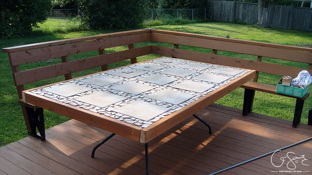 Did your glass patio tabletop break and you’re looking to make a new top? Here’s a super-duper custom patio table that I made using lots of leftover materials. It’s an easy DIY project that can be almost completely customized to anything you want!