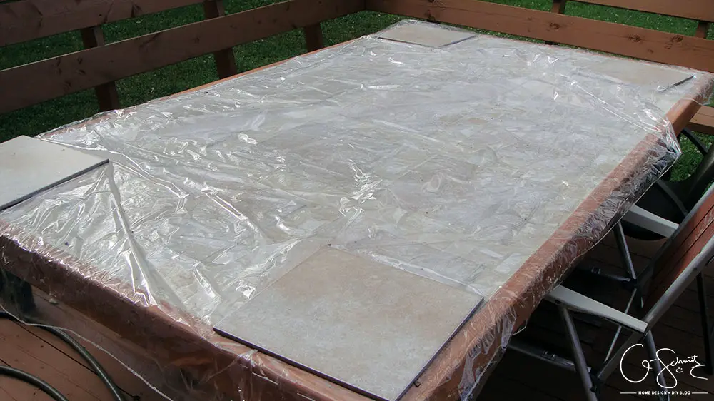 Did your glass patio tabletop break and you’re looking to make a new top? Here’s a super-duper custom patio table that I made using lots of leftover materials. It’s an easy DIY project that can be almost completely customized to anything you want!