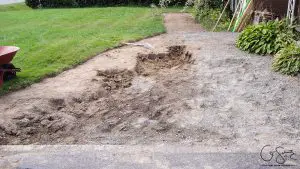 Prepping dirt for gravel is a step you don’t want to skip if you’re planning on doing a DIY walkway. By making sure everything is deep and level now, you’ll avoid some headaches in the long run. 