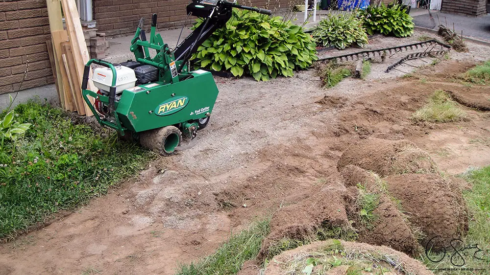 The second step for our DIY Project Walkway this summer – removing turf / sod and grass to make room for landscaping! 