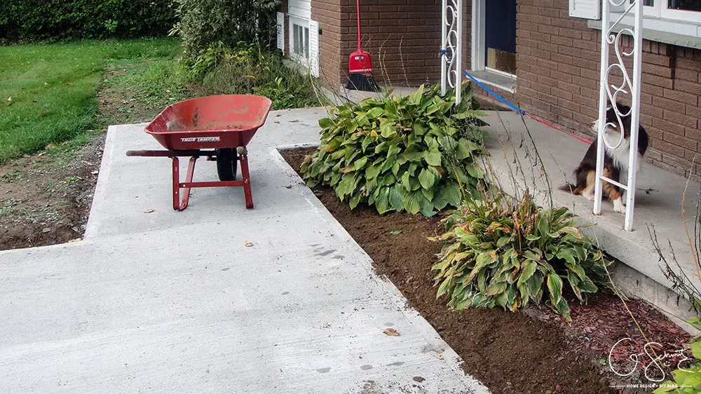 Now that the DIY concrete walkway is in, we just have to do a tiny bit more landscaping and beautification before I can complete this project walkway. Check out the great before and after photos to see all the work we did this summer! 