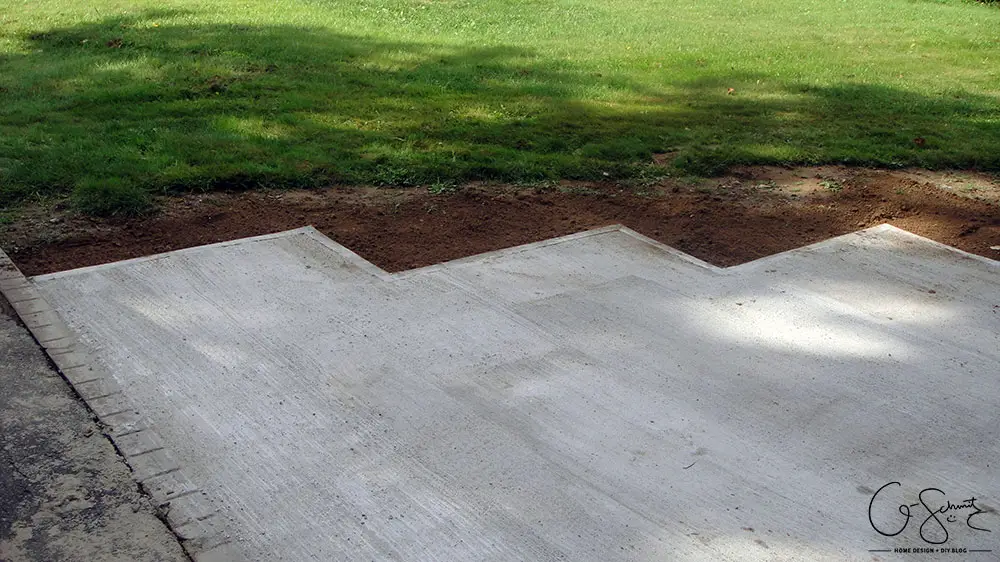 Now that the DIY concrete walkway is in, we just have to do a tiny bit more landscaping and beautification before I can complete this project walkway. Check out the great before and after photos to see all the work we did this summer! 