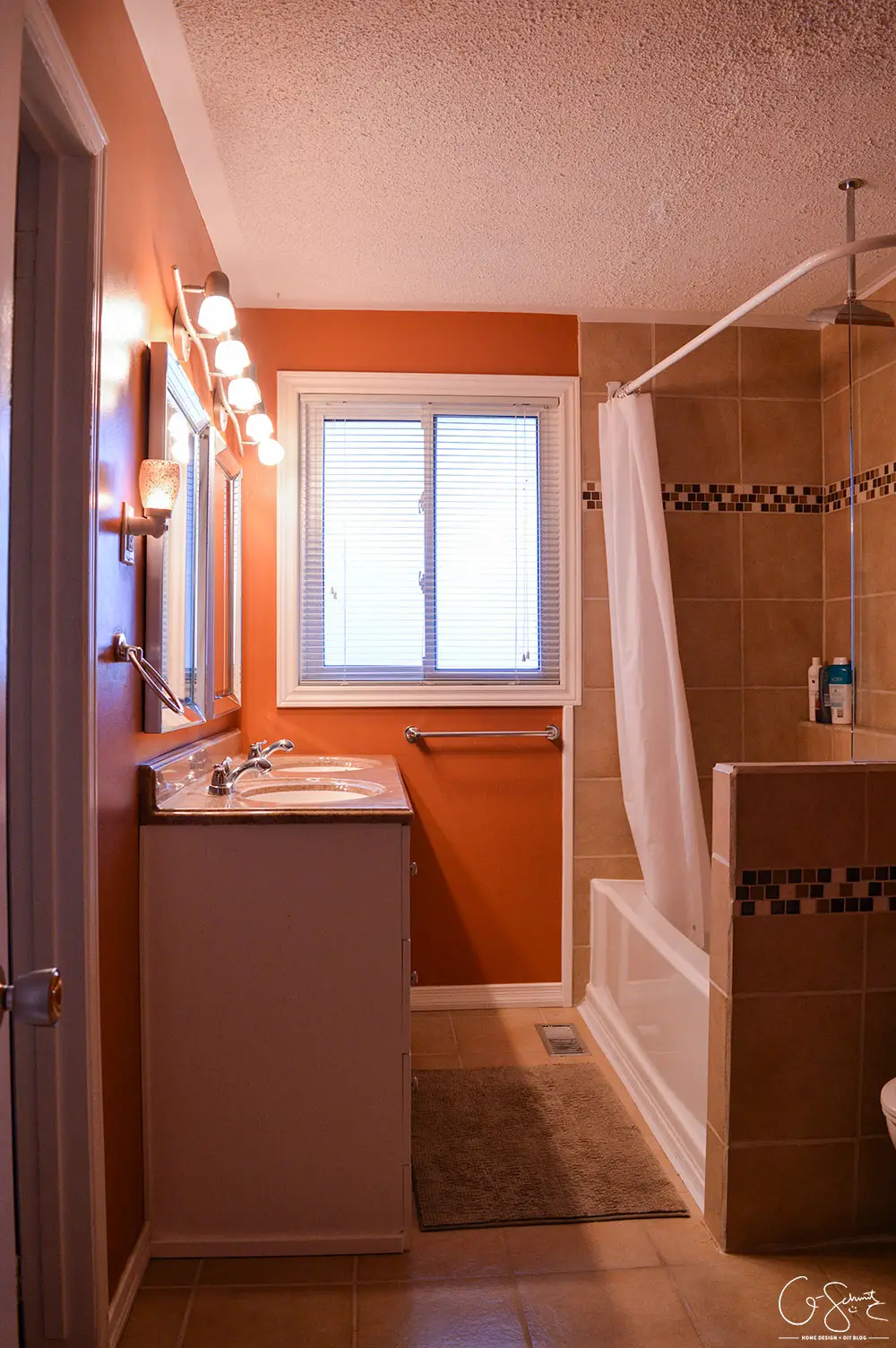 Have you ever tackled your own DIY bathroom renovation? Here is what our main bath looks like after we did ours! 