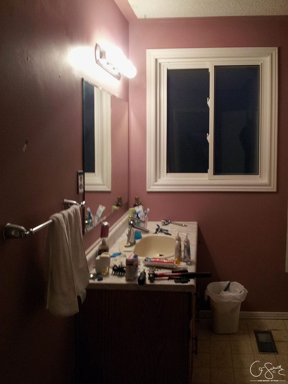 Here are the before pictures of our main DIY bathroom renovation... complete with pink walls, enclosed toilet niche and a full/drywall linen closet!