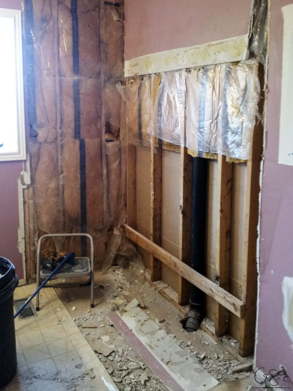 Here are the before pictures of our main DIY bathroom renovation... complete with pink walls, enclosed toilet niche and a full/drywall linen closet!